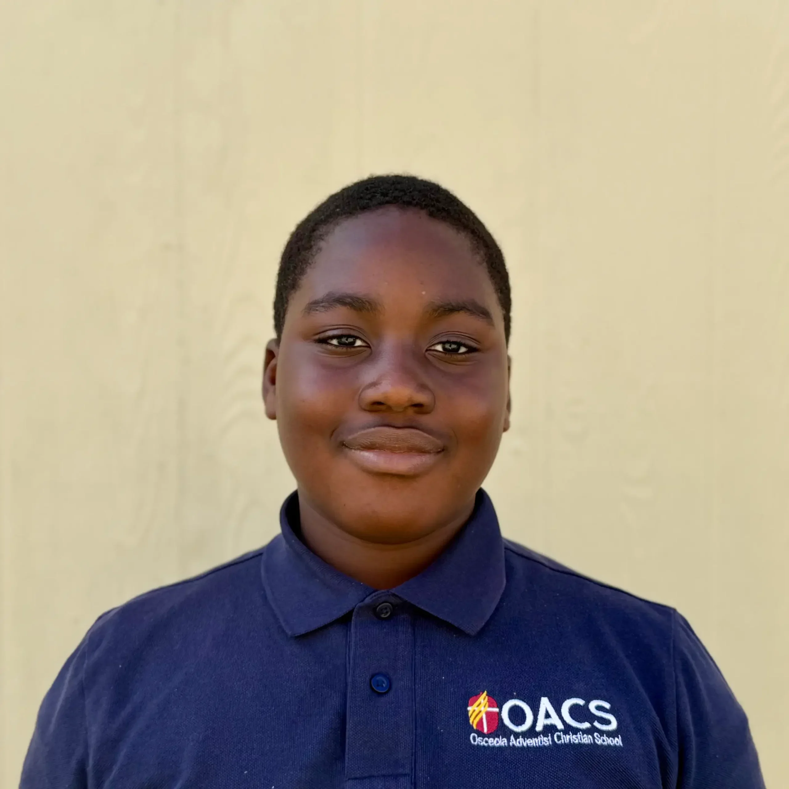 Jason (Student) Osceola Adventist Christian School student smiling at the camera