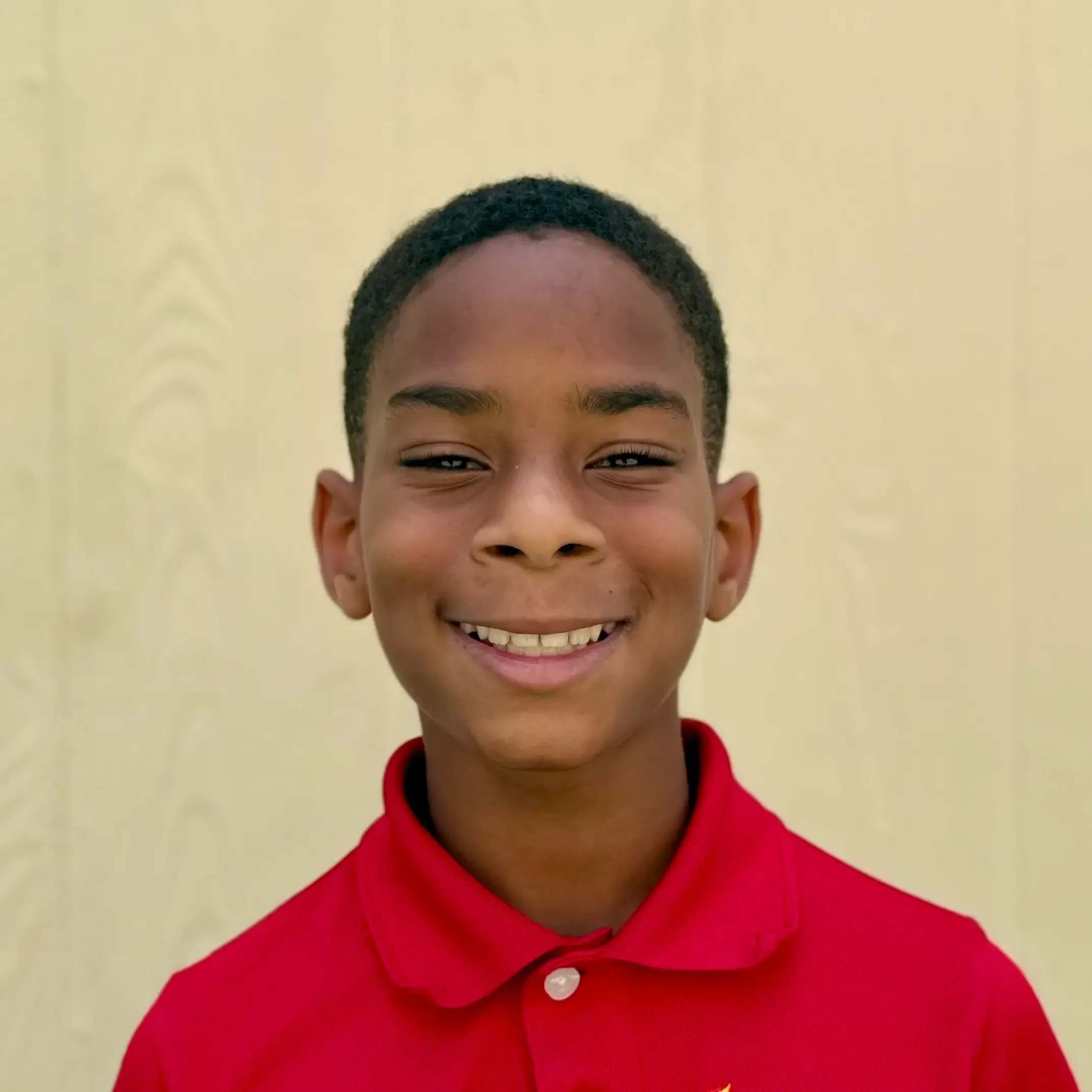 Kyron (Student) Osceola Adventist Christian School student smiling at the camera